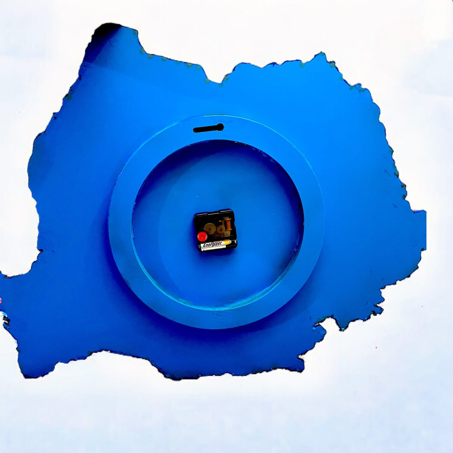 Back side of the clock, hanging hole and clock mechanism