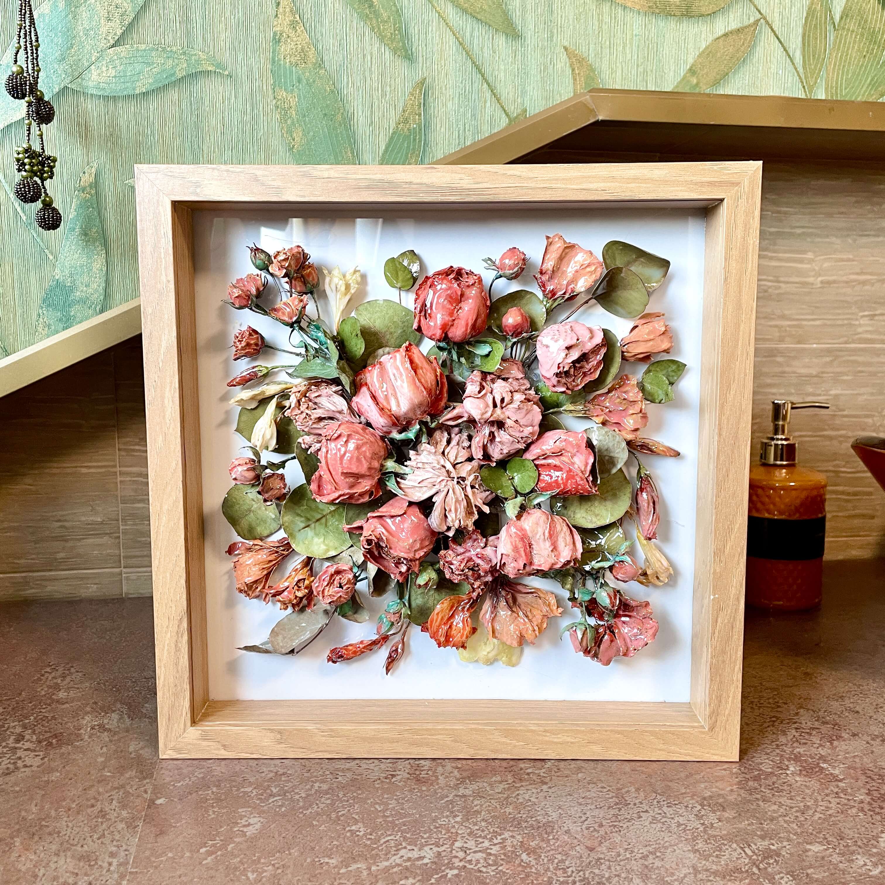 Wedding bouquet shadowbox as home decor, placed in modern interior