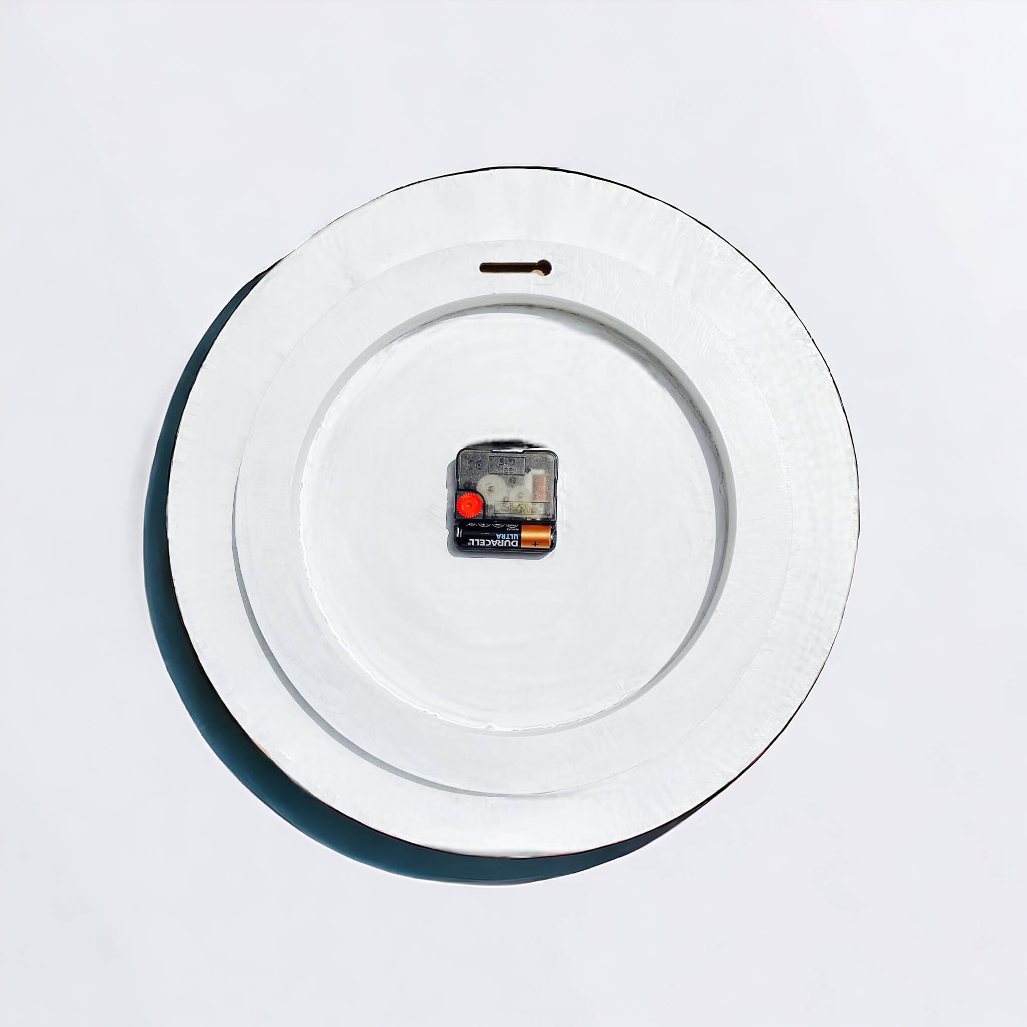 Wall clock backside hanging hole and battery