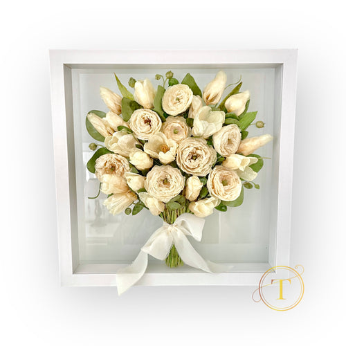 Bouquet of white flowers in a white frame on a white background