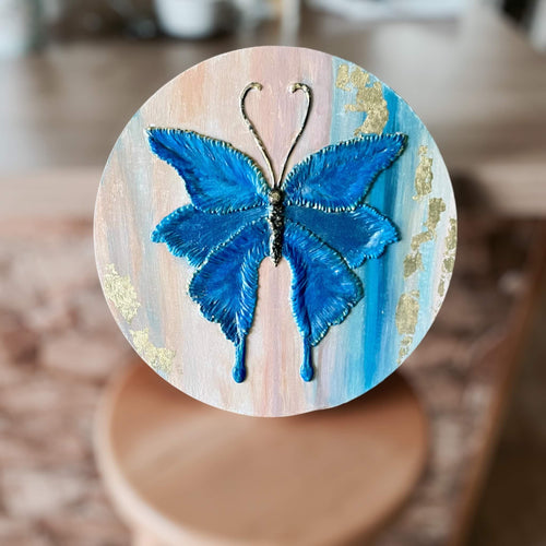 Textured Butterfly – tablou rotund cu fluture albastru si accente aurii, Ø30 cm