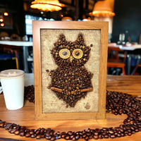 Owl made of coffee beans wall art picture in a coffee shop background