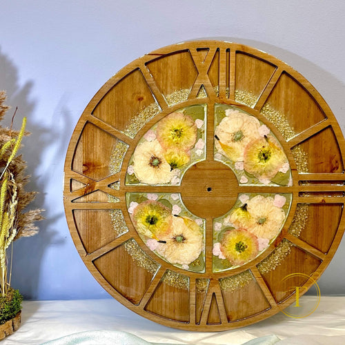 Custom wall clock made with preserved wedding bouquet flowers – front view.