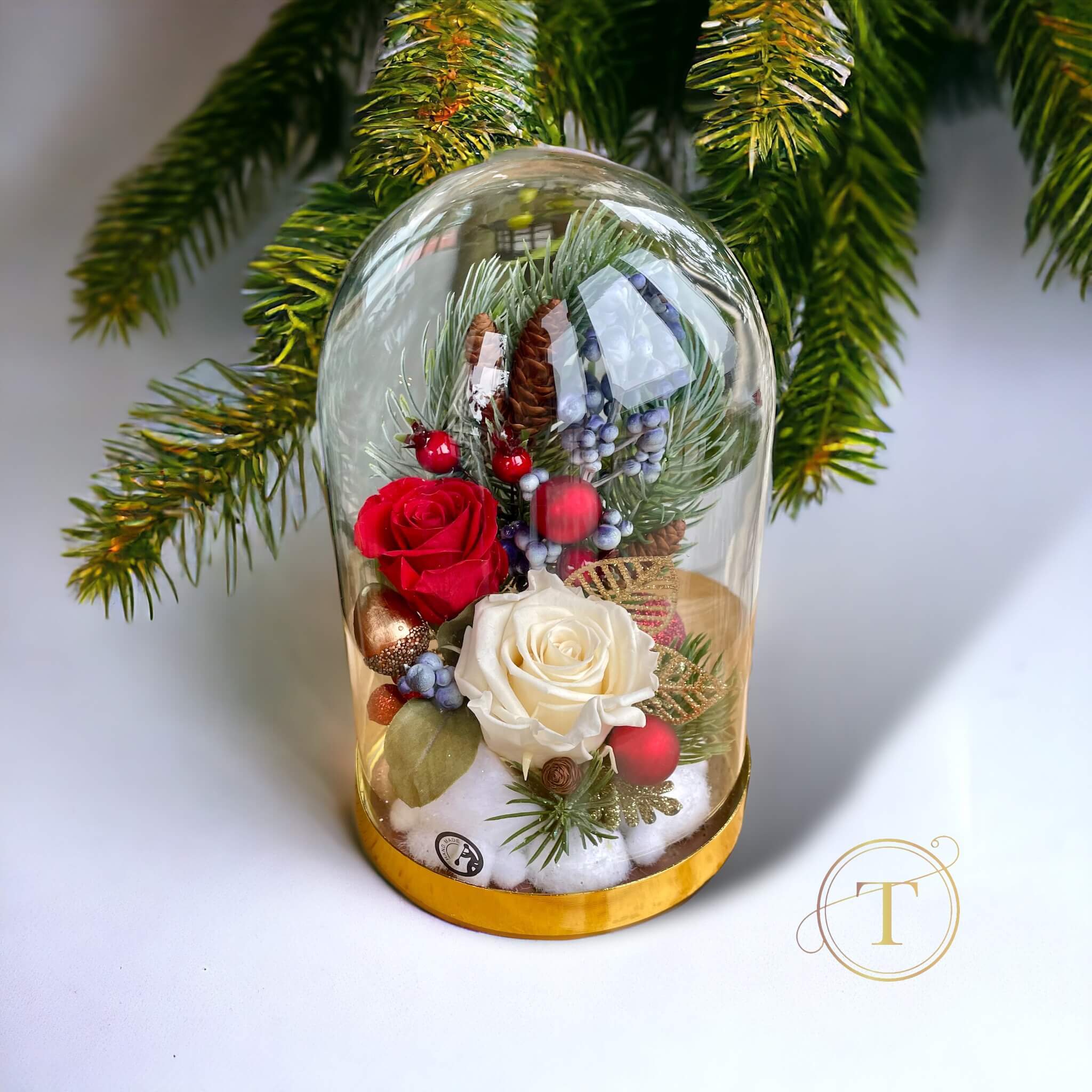 Red and white roses Christmas Cloche arrangament under Christmas tree