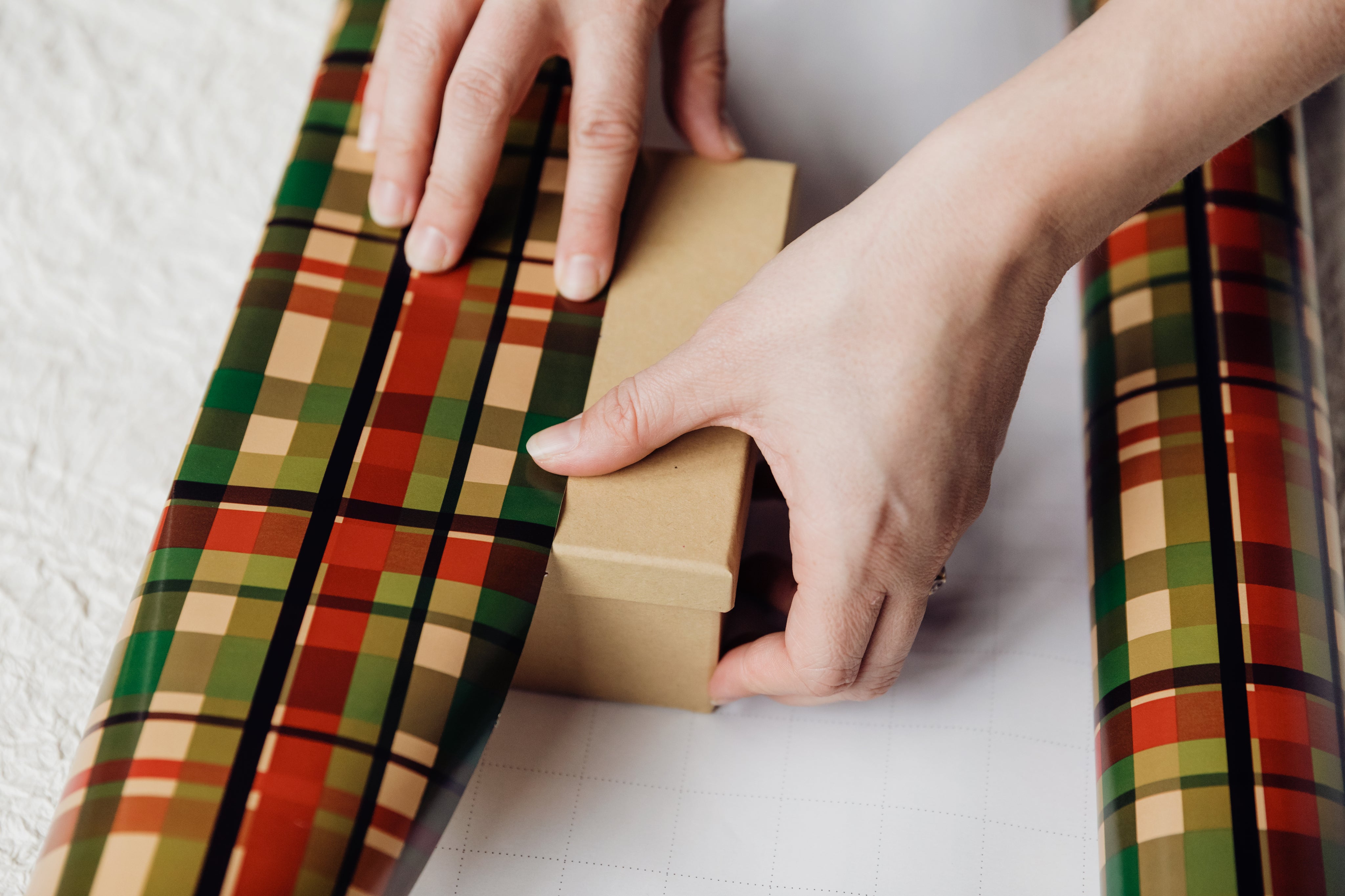 hands-wrapping-presents-with-paper.jpg