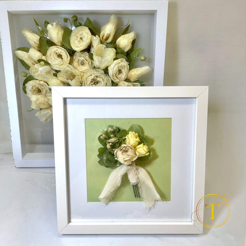 Framed bouquet of white flowers and a framed close-up of a floral arrangement on a light background.