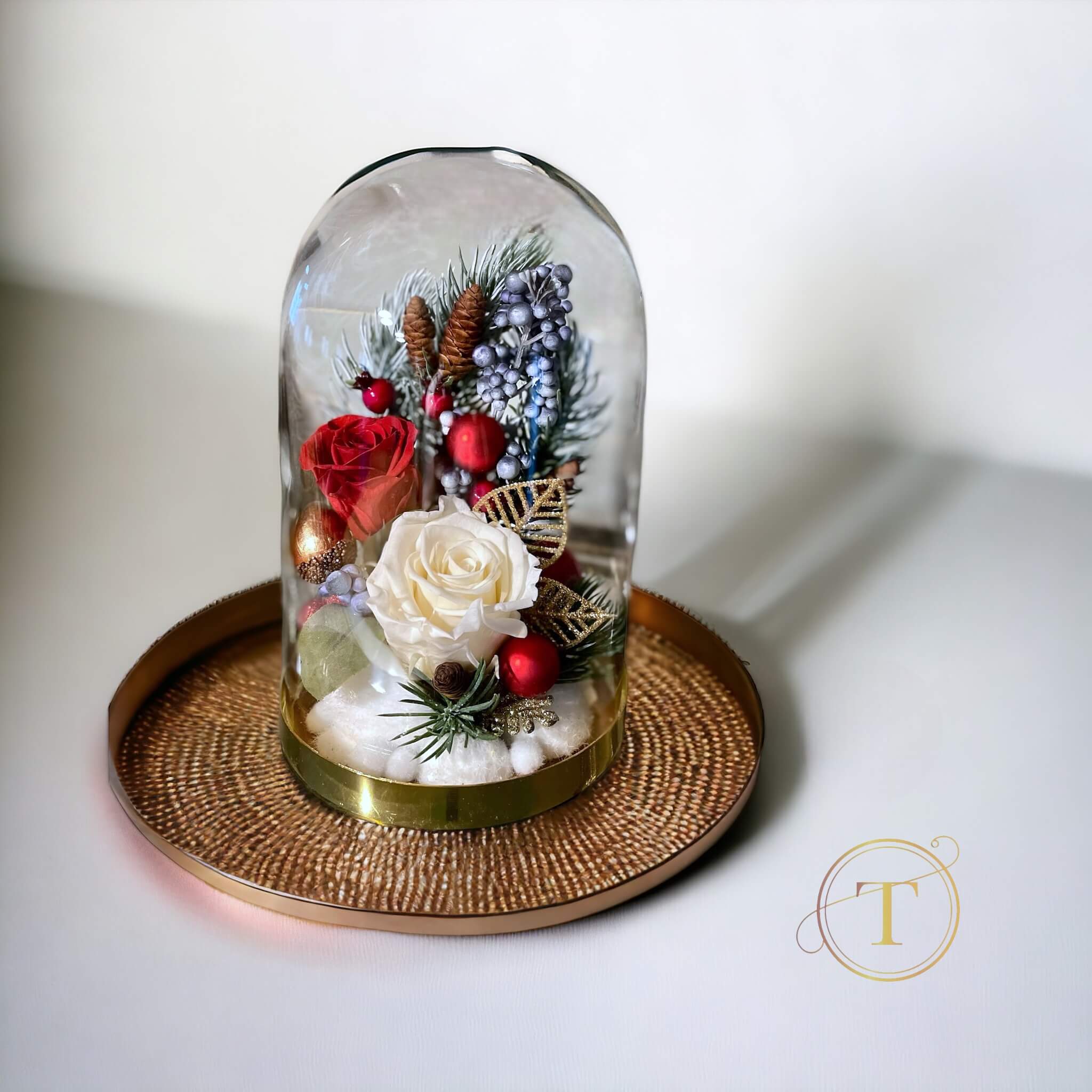 Preserved roses arrangement in a glass dome