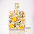 Kitchen serving board made of orange slices and epoxy resin